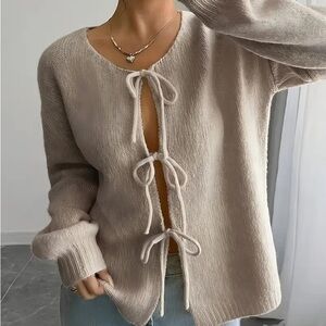 NWOT Elegant Cream Soft Sweater with Bow Details